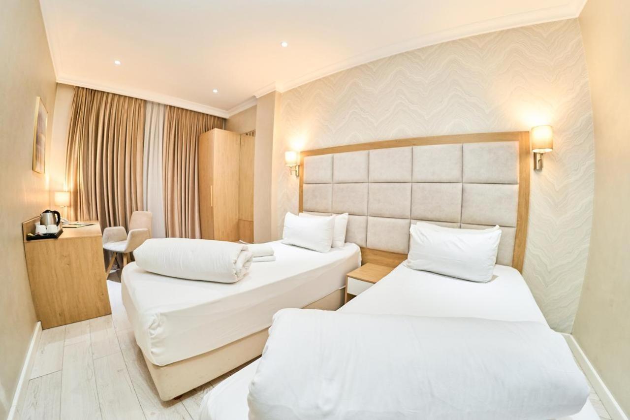 Edem Hotel Turkistan الغرفة الصورة